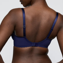Load image into Gallery viewer, Blue bra worn by a person on a plain background
