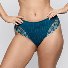 Load image into Gallery viewer, Teal lace underwear worn by a person on a plain background
