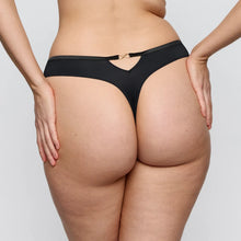 Load image into Gallery viewer, Person wearing a black thong against a plain background
