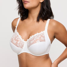 Load image into Gallery viewer, BEST SELLER!
This is our most popular bra, and for good reason! Three-section wire bra with a legendary fit and a light look. The top of the cup is finished with subtle two-tone embroidery that runs into the straps. The cups are deeper than any other Prima Donna bra for a perfect fit.  The firm cups lift the bust while the higher side section covers more and gives proper support which ensures better uplift for largest sizes.
Fabric: Polyamide: 56%, Polyester: 25%, Cotton:12%, Elastane: 7%. IVORY.
