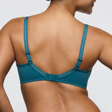 Load image into Gallery viewer, Teal bra worn by a model on a plain background
