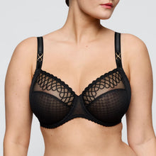 Load image into Gallery viewer, Black lace bra on a plain background
