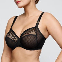 Load image into Gallery viewer, Black lace bra on a model against a plain background

