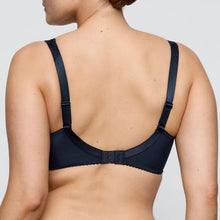 Load image into Gallery viewer, Navy blue bra worn by a person on a light gray background
