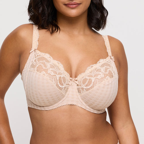 The Madison series is a keeper for many fans. No surprise, because this is very much a youthful, elegant series, thanks to the combination of checks and lace.This bra’s sublime fit has long been acclaimed. The cups are sewn from three sections to support, centre and lift the bust optimally. It not only makes you look slimmer, it’s exceptionally comfortable too!  Fabric content: Polyamide: 83%, Elastane:17%. Caffé Latte.