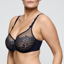 Load image into Gallery viewer, navy lace bra worn by a model on a plain background
