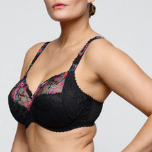 Load image into Gallery viewer, Black lace bra with floral embroidery on a plain background
