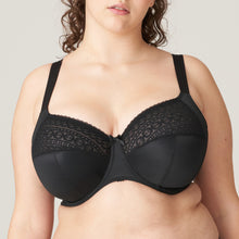 Load image into Gallery viewer, Famous for their beautifully crafted bras catering to the larger bust, Montara is a new member to the Prima Donna family. The is a three-piece underwire bra with a unique fit and a modern look. It has a pretty stretchy lace on the top of the cup. The base is smooth for versatile wear under garments. The straps are decorative and offer full support.   Fabric: Polyamide: 57%, Polyester: 34%, Elastane: 9%. Black.
