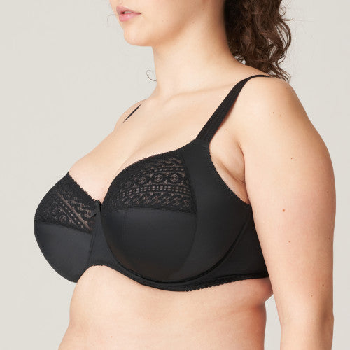 Famous for their beautifully crafted bras catering to the larger bust, Montara is a new member to the Prima Donna family. The is a three-piece underwire bra with a unique fit and a modern look. It has a pretty stretchy lace on the top of the cup. The base is smooth for versatile wear under garments. The straps are decorative and offer full support.   Fabric: Polyamide: 57%, Polyester: 34%, Elastane: 9%. Black.