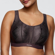 Load image into Gallery viewer, Black patterned sports bra with 'Primadonna' branding on a neutral background
