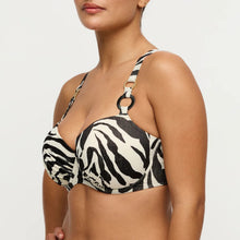 Load image into Gallery viewer, Zebra print bikini top worn by a model on a white background
