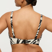 Load image into Gallery viewer, Person wearing a zebra print bikini top on a plain background
