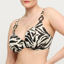 Load image into Gallery viewer, Person wearing a zebra print bikini top on a plain background
