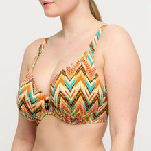 Load image into Gallery viewer, Woman wearing a colorful zigzag patterned bikini top on a plain background
