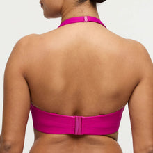 Load image into Gallery viewer, Person wearing a bright pink bikini top on a plain background
