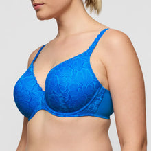 Load image into Gallery viewer, Blue lace bra on a plain background
