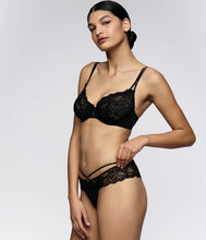 Load image into Gallery viewer, Woman wearing a black lace lingerie set on a plain background
