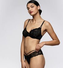 Load image into Gallery viewer, Woman wearing a black lace lingerie set on a plain background
