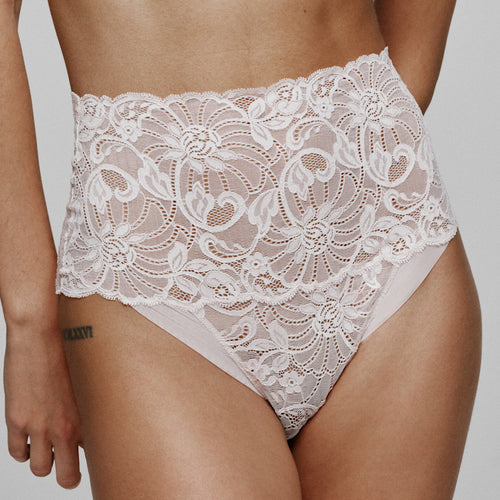 Marble. This is a fabulous all lace Full Brief. Up to the waist and with full back coverage this Retro style brief offers an attractive and smooth look under any outfit. 
Fabric Content: Elastane:15%, Polyamide:80%, Cotton:5%