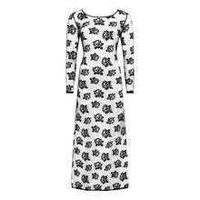 Load image into Gallery viewer, Black floral patterned dress on a white background
