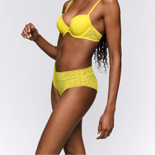 Load image into Gallery viewer, Woman wearing a yellow lingerie set against a plain background
