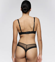 Load image into Gallery viewer, Person wearing a black lingerie set on a plain background
