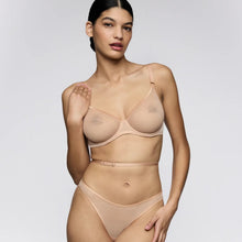 Load image into Gallery viewer, Woman wearing a beige shapewear bodysuit on a white background
