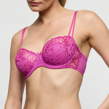 Load image into Gallery viewer, Pink lace bra worn by a model on a plain background
