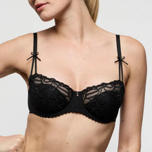 Load image into Gallery viewer, Black lace bra worn by a model on a plain background
