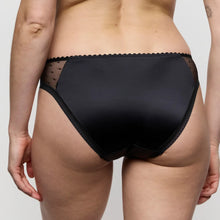 Load image into Gallery viewer, Person wearing black underwear on a plain background
