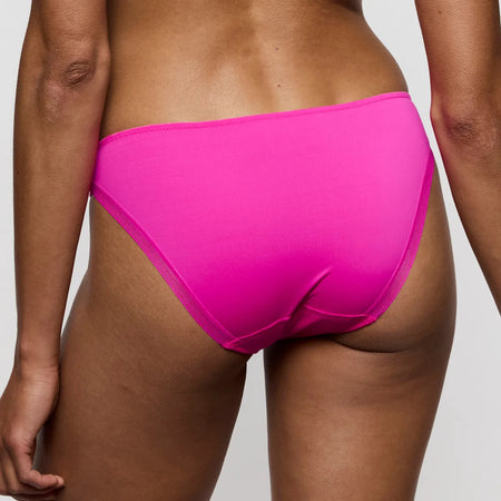 pink underwear back on model, white background