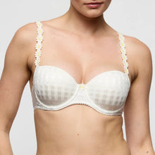 Load image into Gallery viewer, White bra with floral straps worn by a model on a plain background
