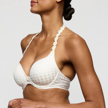 Load image into Gallery viewer, White bra with floral details worn by a model on a plain background

