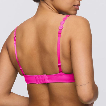 back of pink bra on model, white background