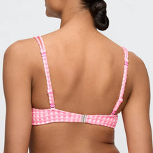 Load image into Gallery viewer, Pink bikini top with thin straps on a plain background
