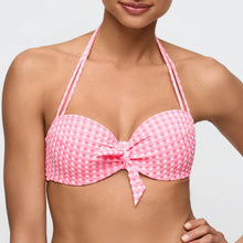 Load image into Gallery viewer, Pink checkered bikini top worn by a model on a white background
