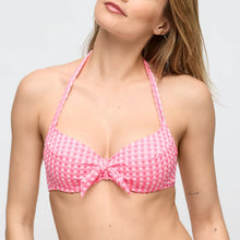 Load image into Gallery viewer, Woman wearing a pink checkered bikini top on a light gray background
