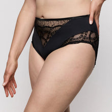 Load image into Gallery viewer, Black lace underwear being worn against a plain background
