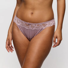 Load image into Gallery viewer, Lace underwear worn by a model on a plain background
