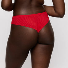 Load image into Gallery viewer, Red underwear worn by a person on a white background
