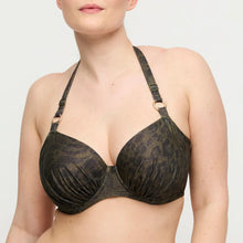 Load image into Gallery viewer, Black patterned bra worn by a person on a white background
