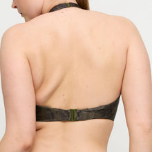 Load image into Gallery viewer, Person wearing a green denim bra on a plain background

