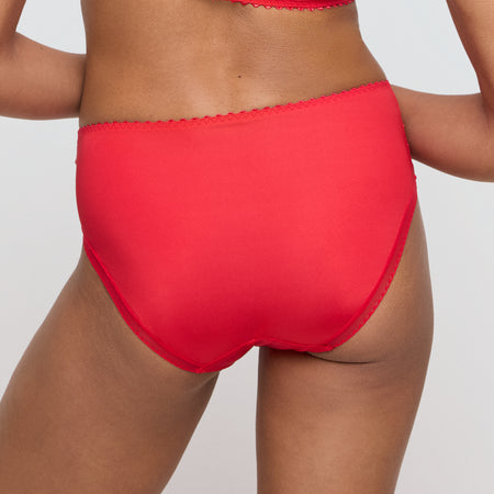 Red bikini bottom on a plain background