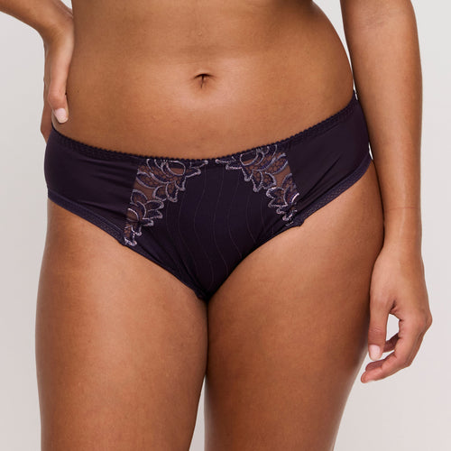 Amethyst lace underwear on a plain background