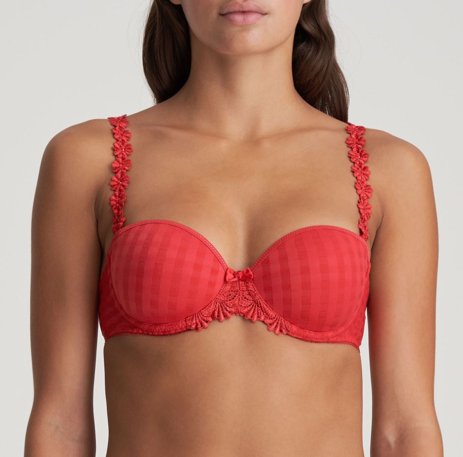 Strapless formed cup underwire bra with a balconnet line. Straight back with silicone strip to give extra support when the bra is worn strapless. Excellent shape and support for those strapless occasions. May also be worn in a halter style. The signature daisy straps complete the picture!  Fabric Content: Polyamide: 49%, Polyester: 41%, Elastane: 10%