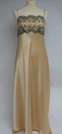 Full length pure Silk nightgown. This nightdress has a black lace bodice (lined at the back for full coverage) which contrasts beautifully with the golden honey full length skirt. Full length in a heavy silk satin, there is a slit to the side for ease when sleeping. 