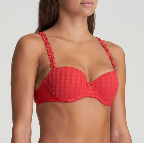 Smooth formed cup underwire balconnet bra with daisy strap detail. This underwire bra may be converted to a halter strap. This bra has the added advantage that it may be used as a halter or crossed over at the back.  Fabric Content: Polyester: 53%, Polyamide: 39%, Elastane: 8%