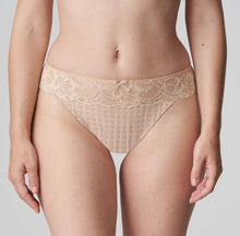 Load image into Gallery viewer, This G/String leaves the bottom uncovered and makes the leg appear longer. Sexy yet discreet, with a super lacy look. Non bulky under clothing.  Fabric content: Polyamide: 73%, Elastane:19%, Cotton: 8%. Caffé Latte.
