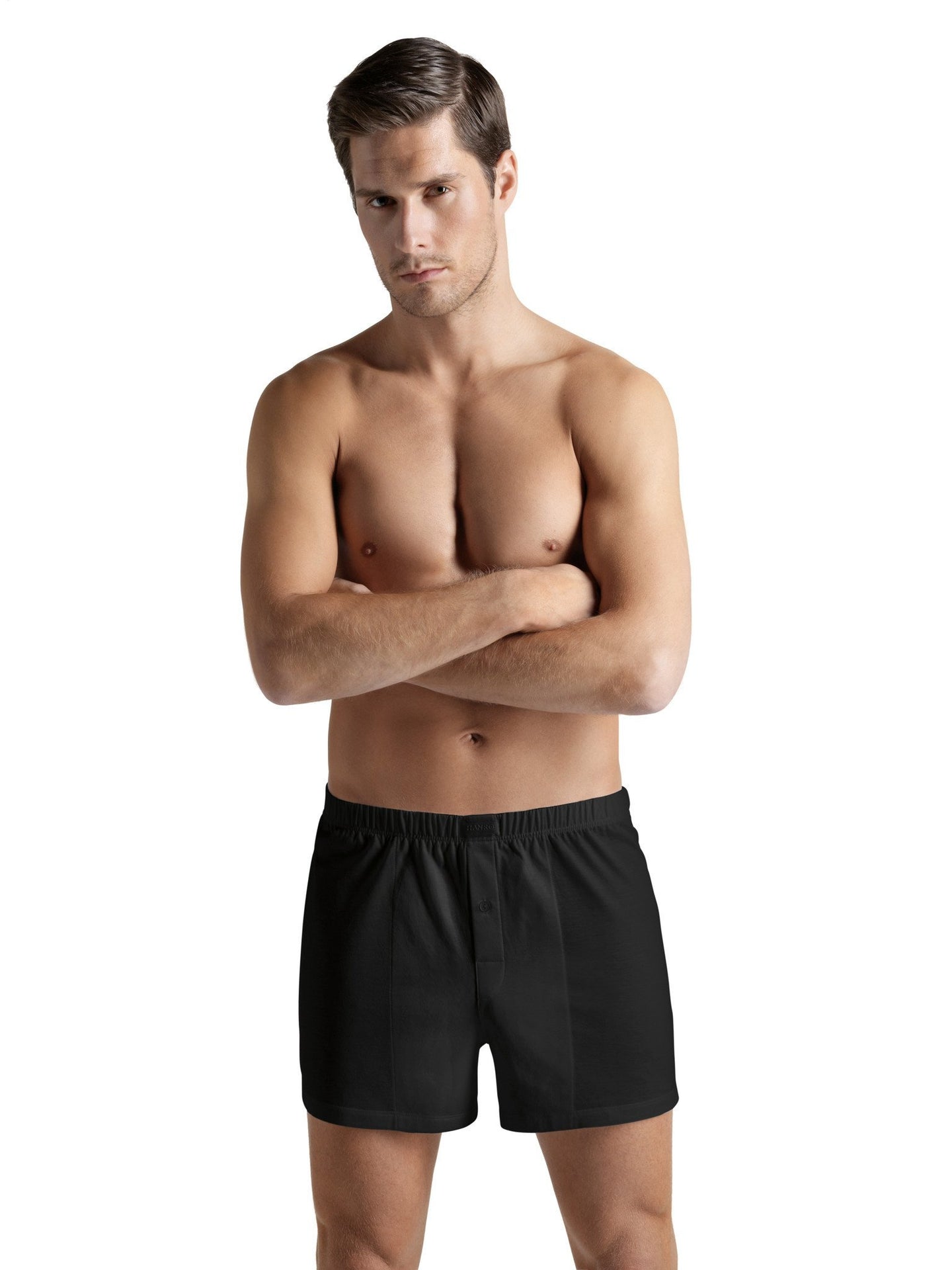 100% Pure Cotton loose fitting boxer shorts with buttoned fly.  Available in Black, Midnight Navy and White.   Fabric Content: 100% Mercerised Cotton. Made in Europe.