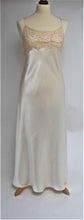Load image into Gallery viewer, Beautiful full length pure silk satin nightgown. The bodice is composed of sheer contrasting ecru embroidered lace. Full length in a heavy silk satin, there is a slit to the side for ease when sleeping. The scooped to waist back with lace trim is stunning. The nightdress is cut on the bias for full movement. The rouleau straps give an extra finesse to this delightful nightgown.
